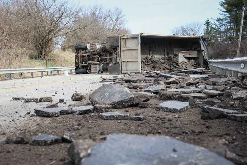A semitruck rolled over Saturday, March 28, 2026, on Route 120 between Fleming and Thompson roads in unincorporated Woodstock, spilling a load of asphalt.