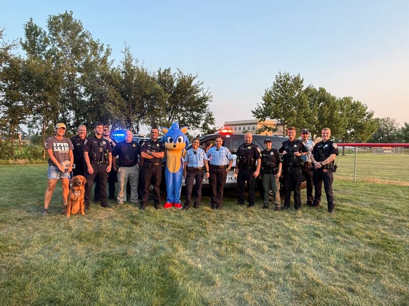 Yorkville Police authorities gather during the National Night Out event in Yorkville. Pictured, Erin Evans and therapy dog Eli, Chief Jim Jensen, Officer Sam Tickel, Officer Bret Johnson, Deputy Chief Ray Mikolasek, Deputy Chief Garrett Carlyle, Sonic, CSO Naily Vargas, CSO Natalia Perez, Sergeant. Chris Hayes, Inspector Mariesa Shapiama, Officer Peyton Heiser, CSO Tyler Madsen and Officer Andrew Camis.