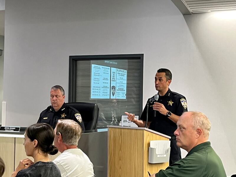Yorkville Police Deputy Chief Garrett Carlyle (right) presents figures on incidents involving homeless individuals in town at the Sept. 23, 2025 city council meeting. Chief James Jensen (left) spoke in support of the ordinance.