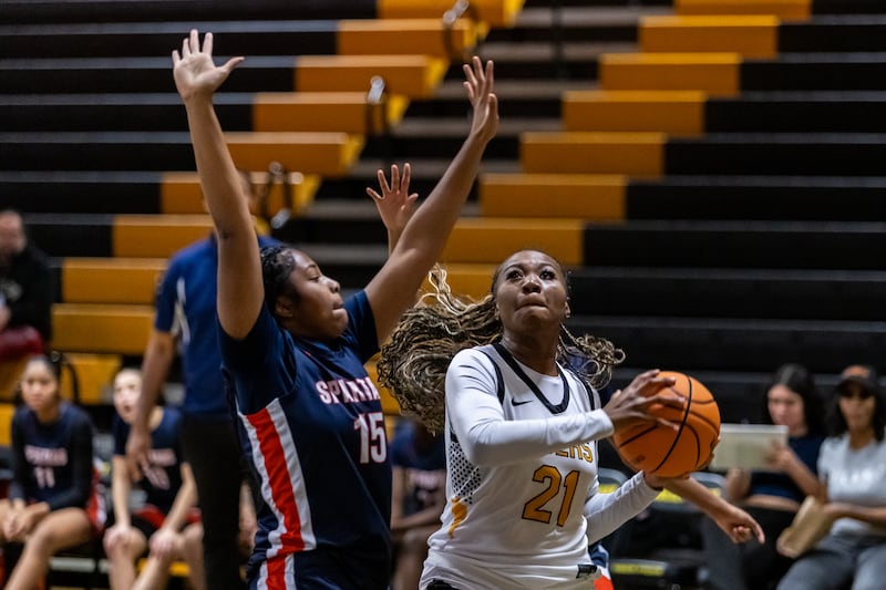 Joliet West's Jada Thompson drives to the basket during a varsity girls basketball game against Romeoville at Joliet West on Dec. 11, 2025.