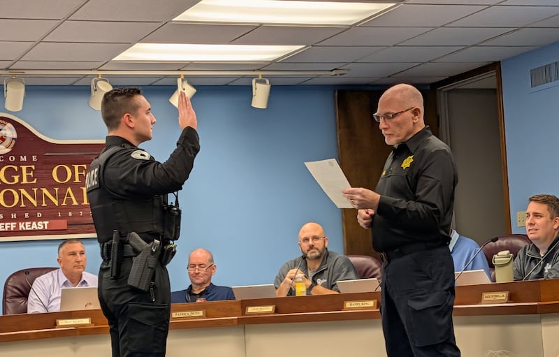Patrolman Dylan Lorek is sworn in by Bourbonnais Police Chief Dave Morefield on Jan. 20, 2026.