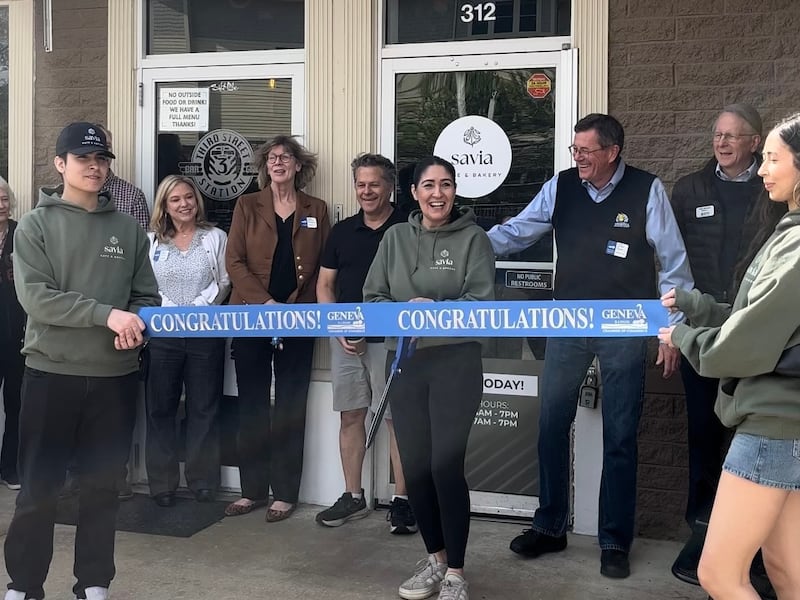 The Geneva Chamber of Commerce celebrating Savia Cafe and Bakery's grand opening