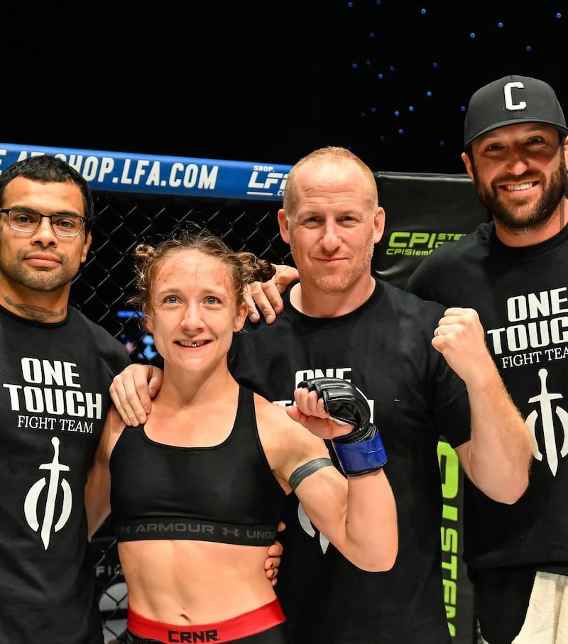 Mackenzie "Mack-Judo" Stiller, who trains at One Touch Fight Team & Academy in Woodstock, will compete in Season 34 of The Ultimate Fighter. Stiller is pictured above with Juan Resendiz (left), coach Brett Brendel (middle right) and Vince DeCicco (right).