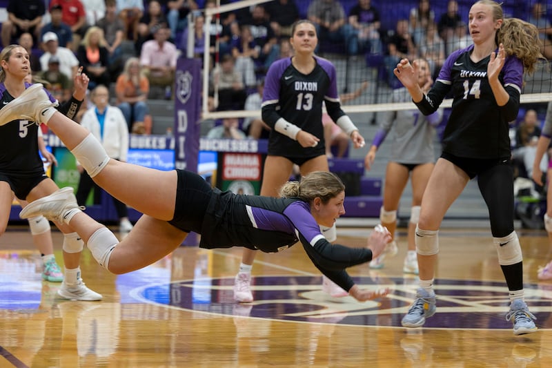 Dixon’s Presley Lappin lands her dive after saving a shot against Rochelle Thursday, August 28, 2025.