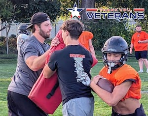 Military experience helped McHenry coach Derek Franzen discover life passion