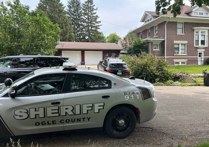 Crime scene technicians were at a Polo home in the 500 block of W. Mason Street on Sunday morning. June 15, 2025, investigating the deaths of two individuals late Saturday night. Ogle County Sheriff Brian VanVickle said police responded to the scene after receiving a 911 call that someone had been shot and hostages were being held. He said the hostages had fled the home before police arrived and there there was no remaining threat to the public. The incident remains under investigation.