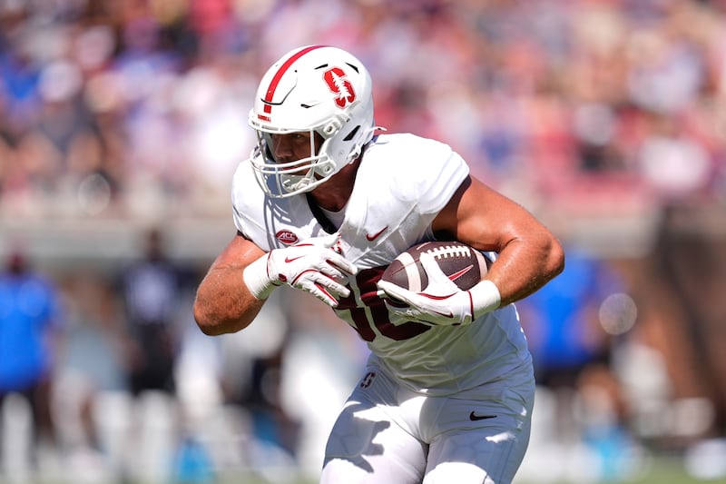 Stanford tight end Sam Roush (86) gains yards after a catch in the first half of an NCAA college football game against SMU, Saturday, Oct. 11, 2025, in Dallas. (AP Photo/Tony Gutierrez)