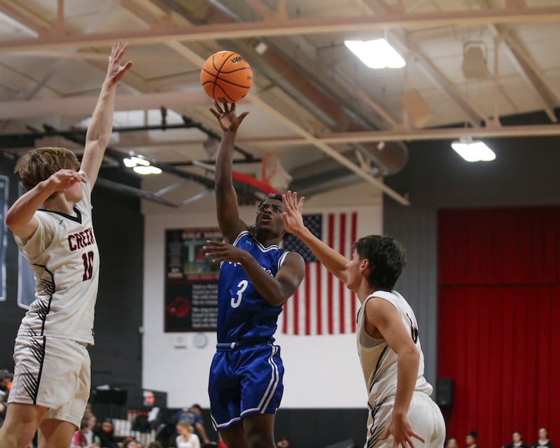 Newark's Reggie Chapman (3) goes up with a short, one-handed shot against Indian Creek on Tuesday, Jan. 13, 2026, in Shabbona.