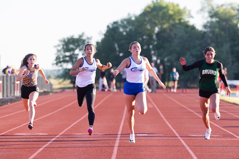 Newman’s Elaina Allen (right) and Paizlee Williams took first and second in the 100 dash Wednesday, May 13, 2026, during the Class 1A Erie Sectional meet.