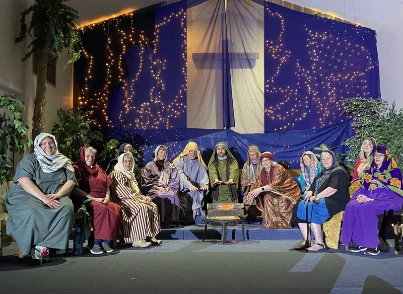 Choir members include (left to right) Katie McCoy, Grace Griffin, Jody Bodamer, Debbie Pease, Deb Basile, Phil Turner, Paul Trotter, Rob Jensen, Shelley Barnett, Jean Whaples, Kate Butler, Chariss Hoffman, and Cheryl Thierry. Absent from the photo are Beverly Neff and Justin Bullington.