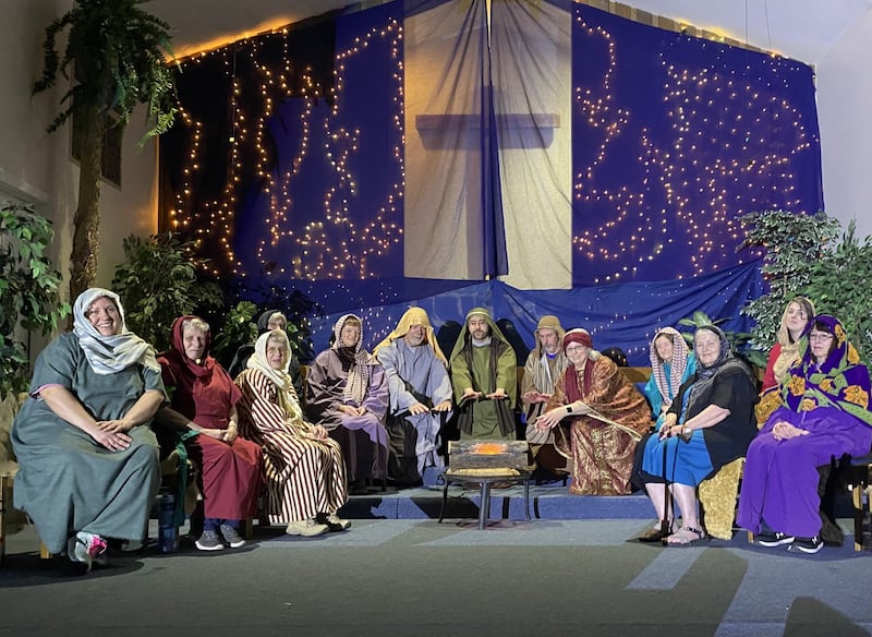 Choir members include (left to right) Katie McCoy, Grace Griffin, Jody Bodamer, Debbie Pease, Deb Basile, Phil Turner, Paul Trotter, Rob Jensen, Shelley Barnett, Jean Whaples, Kate Butler, Chariss Hoffman, and Cheryl Thierry. Absent from the photo are Beverly Neff and Justin Bullington.