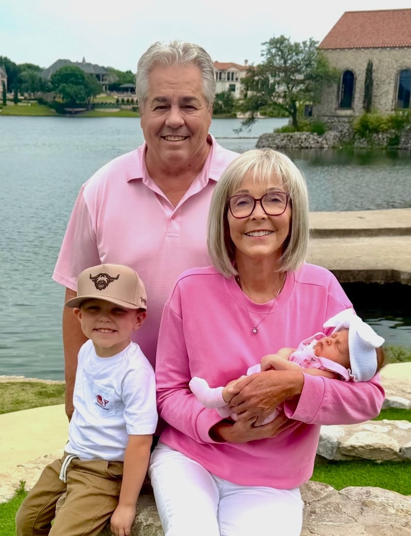 St. Charles residents Michelle and Keith Wilcox on Mother's Day in Florida with grandkids Leyton and baby Kennedy. Michelle is surviving a rare aggressive cancer in the cerebrospinal fluid through specialized treatment at Northwestern Medicine Delnor Cancer Center.