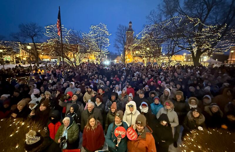People sing along as the the Die Musik Meisters play poker music on Monday, Feb. 2, 2026, during the annual Groundhog Day Prognostication in the Woodstock Square.