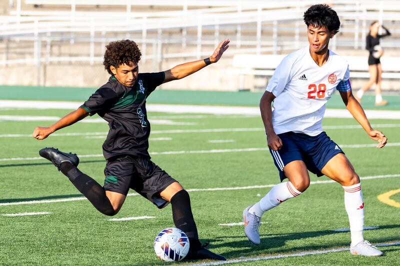 Plainfield Central’s Leo Perez attempts a goal as South Elgin's Pablo Correa plays defense during a game at Plainfield Central on Aug. 28, 2025.