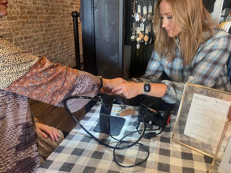 Alana Oelschlager, owner of Forever + a Day: Permanent Jewelry, working at one of her first events at More of Me in Streator.