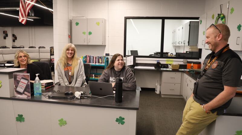 Greg Eiserman, McHenry High School District 156 Freshman Campus principal, meets in the Freshman Campus media cente with staffers Linnea Springston, Shannon Sterrett and Angela Welch on Tuesday, March 18, 2025. Eiserman has been tapped to lead the district's 10-12 grade Upper Campus as its principal next year.