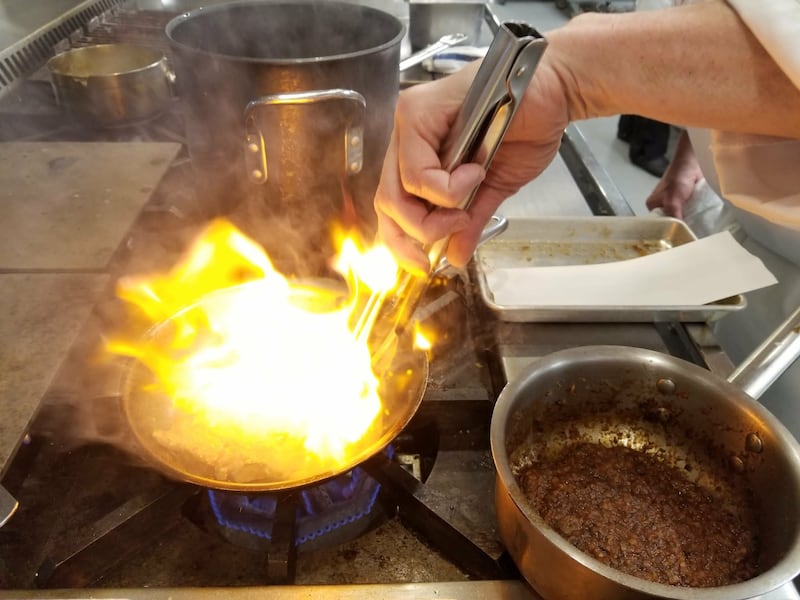 A chef cooks a hibachi-style meal. Zuka Sushi Hibachi & Asian Cuisine recently opened in Bolingbrook.