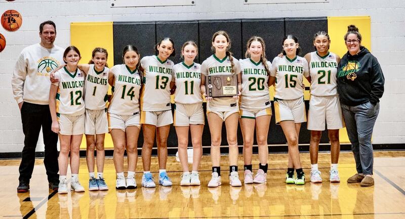 The Spring Valley JFK Wildcats defeated Cambridge 29-27 on Vivi Verucchi last-second shot from half court to capture the Class 2A McNabb Regional eighth-grade championship on Friday night. The Wildcats move on to the Fieldcrest Sectional to play Seneca at 6 p.m. Wednesday. Team members are Coach TJ Orlandi (from left), Claire Dubberstine, Marleigh Gray, Sofia Loya, Nadia Rounds, Josie Edgcomb, Vivi Verucchi, Brynn Pellegrini, Keira Arnold, Miracle Wright and Coach Bri Verucchi.
