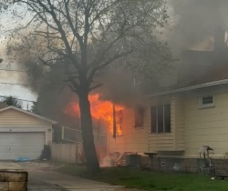 Fire seen coming out of a home in the 1000 block of Highland Avenue in Joliet on Saturday, April 4, 2026.
