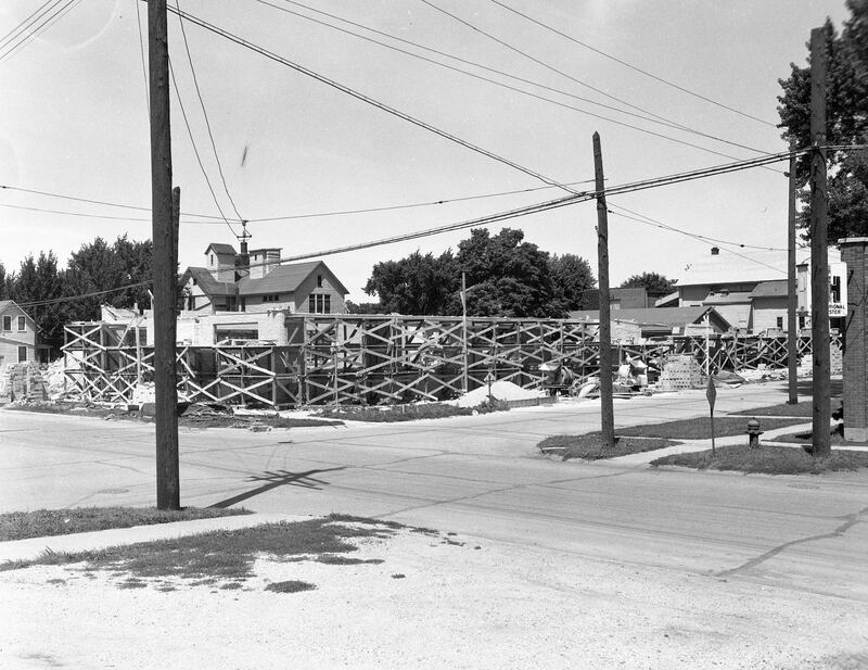 The construction of the DeKalb County Farm Bureau building looking northwest from 6th and Oak Streets, 1950. The Farm Bureau first occupied these offices this week in May 1951.