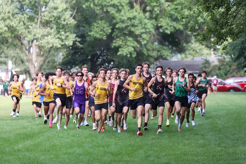Runners from Bradley-Bourbonnais and Herscher race to the front of the pack during the Irish Conditioner at Small Memorial Park in Kankakee on Wednesday, Sept. 3, 2025.
