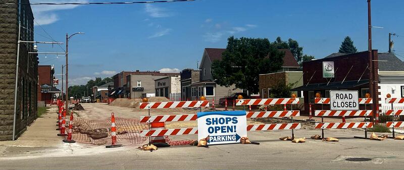 Crews work on new sidewalks along Fourth Street in downtown Fulton, part of an infrastructure project that includes water line upgrades, new streetlights and improved accessibility.