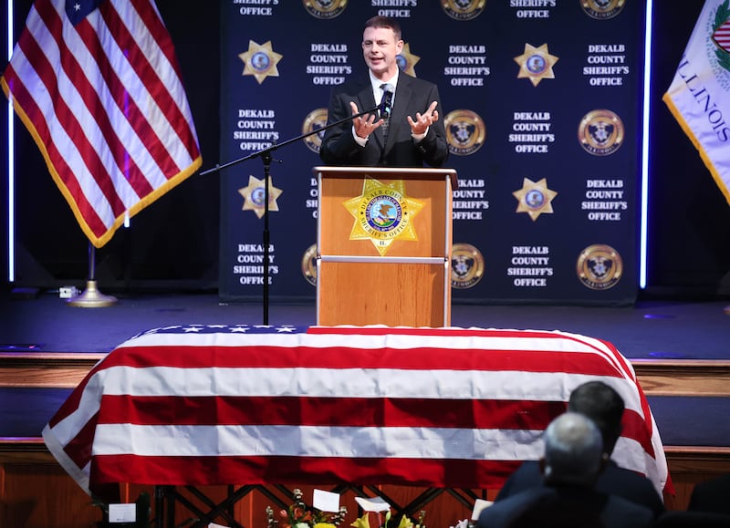 Daniel Scott, son of DeKalb County Sheriff Roger Scott, speaks during the memorial service for the former sheriff Friday, March 7, 2025, at Bethany Road Bible Church in DeKalb. Scott, who was the county sheriff for 36 years, died on February 23 at the age of 78.