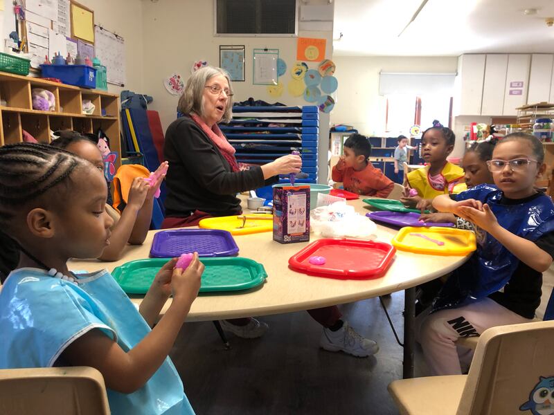 Michelle Lincicome-Hayes works with children Thursday, March 20, 2025, in Elgin's Two Rivers Head Start program. It is one of three locations operated in Kane and DeKalb counties.
