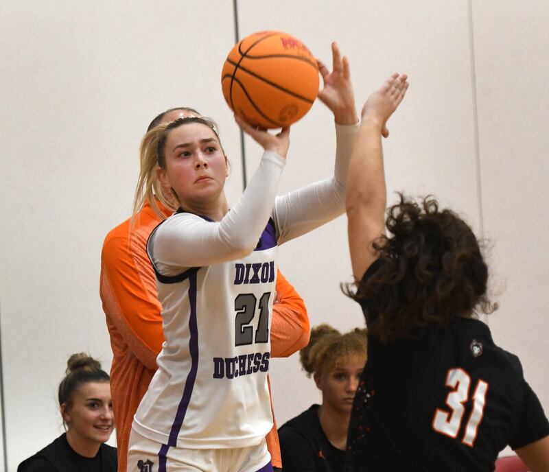 Dixon's Reese Dambman (21) shoots against Harlem at the Oregon Girls Tip-Off Tournament on Wednesday, Nov. 19, 2025 in Oregon.