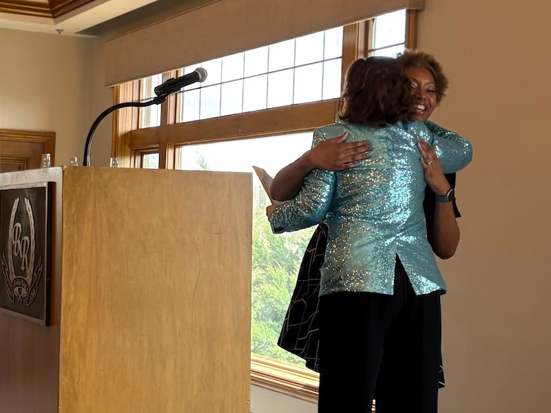 GEM Award winner Stacy Brown, right, receives a hug from Kathleen Caldwell, Crystal Lake Chamber Foundation chair emeritus, at the GEM Leadership Celebration in Lake in the Hills Thursday, April 23, 2026.