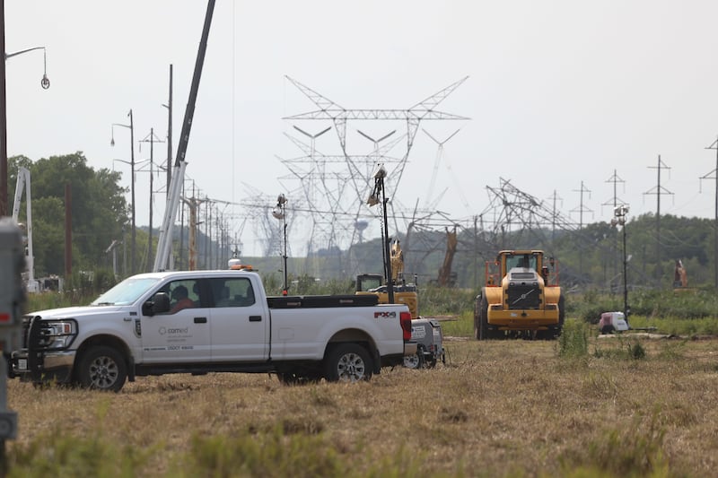 ComEd crews continue to work on the power lines in Channahon on Tuesday, July 23, 2024 after a tornado, on Monday July 15,  knocked several of the power line down, shutting down Interstate 55 for three days.