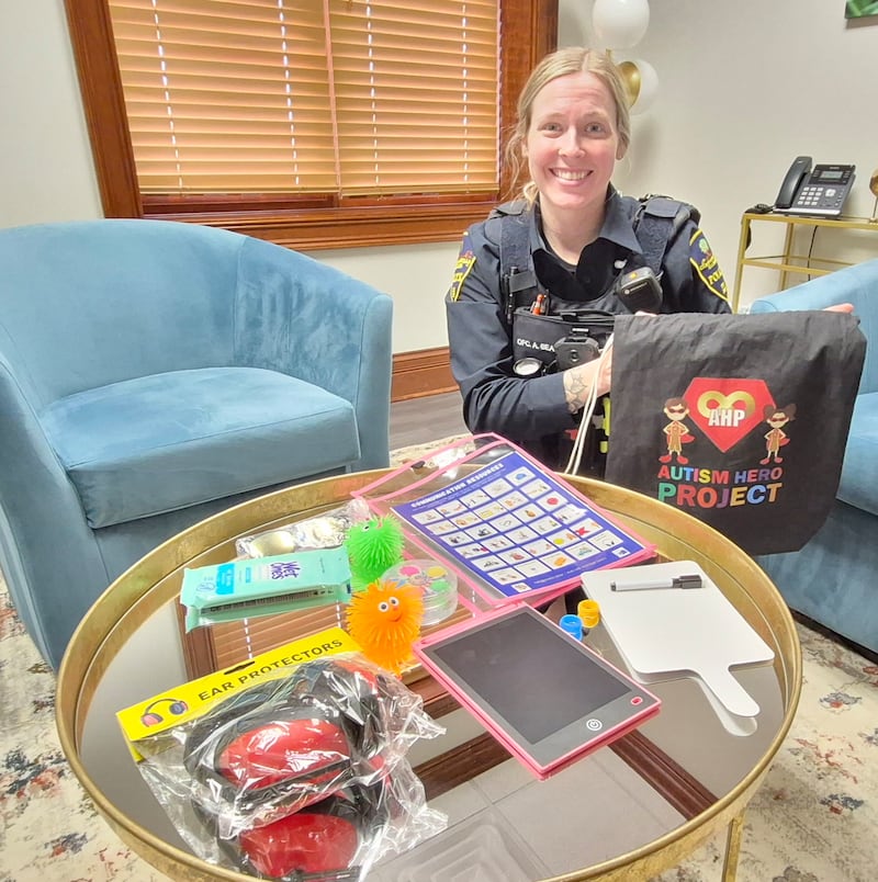 Campton Hills Police Officer Stavroula Tsina displays autism sensory kits which are now included in all the village's patrol cars. The kits are designed to assist officers when interacting with individuals on the autism spectrum or those experiencing sensory sensitivities.