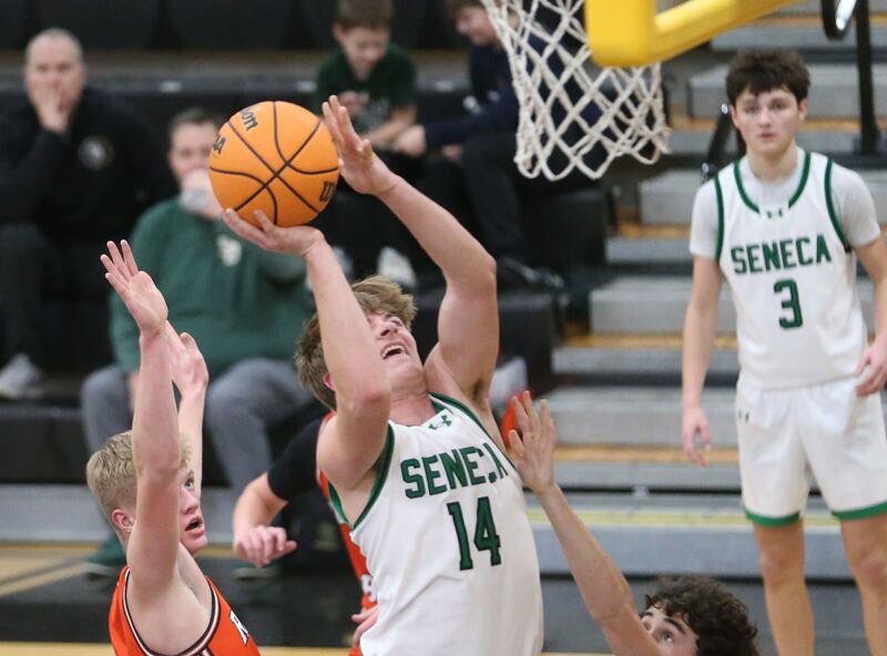 Seneca's Cam Shriey posts up a shot against Roanoke-Benson during the Tri-County Conference Tournament on Tuesday, Jan. 27, 2026 at Putnam County High Schooo.