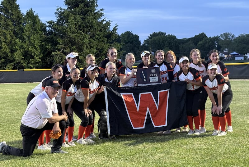 Gardner-South Wilmington players pose with the Class 1A Indian Creek Sectional championship plaque after defeating Serena 4-1 on Friday night at Indian Creek High School.