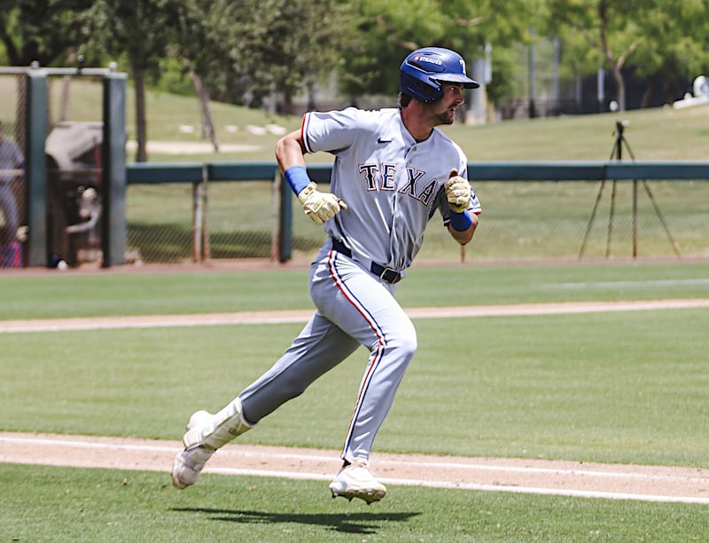 Morris graduate Jack Wheeler heads to first after getting a hit for the ACL Rangers in the Arizona Complex League.