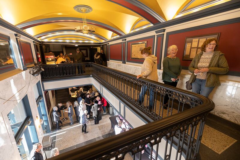 Visitors check out the newly painted walls and ceiling of The Dixon Sunday, March 2, 2025, as the theater hosts its first show since being closed for renovation.
