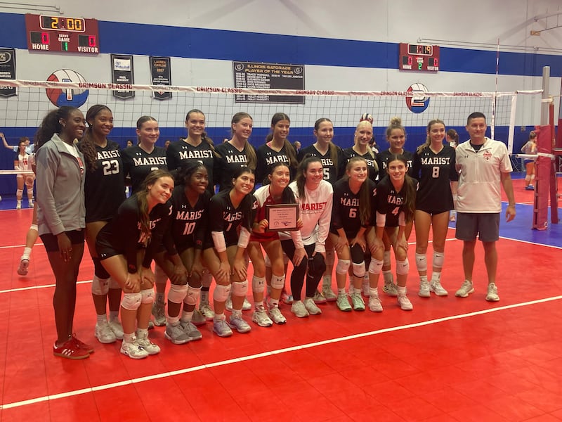 The Marist volleyball team after winning the Plainfield North Invite.