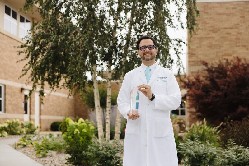 Dr. Joehar Hamdan, oncologist with Riverside Cancer Institute, poses with the 2025 Samaritan of the Year award. Courtesy of Riverside Healthcare.