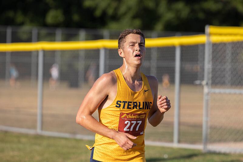 Sterling’s Charles Johnson takes the title Tuesday, Sept. 16, 2025, in the boys race of the Twin Cities Triangular in Rock Falls.