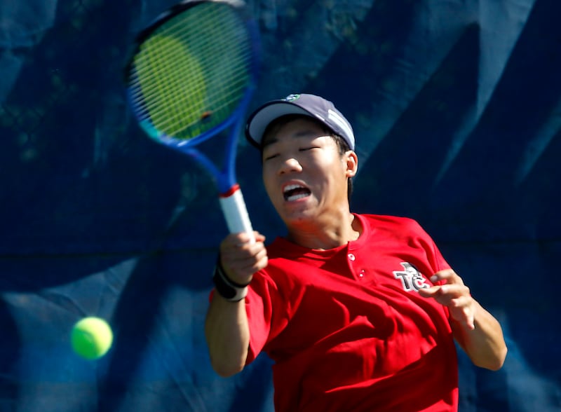 Timothy Christian’s Hudson Tseng returns the ball as he competes in the Class 1A Boys State Tennis Tournament on Thursday, May 28, 2026 at Vernon Hills High School.