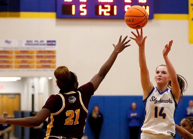 Johnsburg's Summer Toussaint (right) shoots the ball over Chicago Marshall's Alysha Murphy during a IHSA Class 2A Johnsburg Sectional girls basketball semifinal game on Tuesday, February, 24, 2026, at Johnsburg High School.
