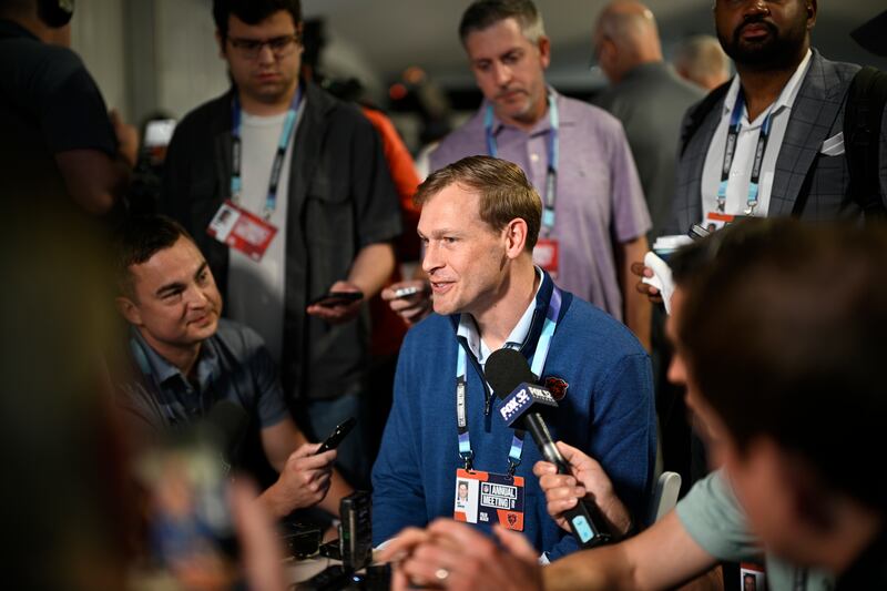Chicago Bears head football coach Ben Johnson, center, meets with reporters during a media availability at the 2025 NFL annual meetings, Tuesday, April 1, 2025, in Palm Beach, Fla. (Phelan M. Ebenhack/AP Content Services for the NFL)