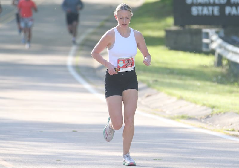 Regan Shipp of Deer Grove, runs in the Starved Rock Country half-marathon on Saturday, May 10, 2025 at Starved Rock State Park. The former Regan Weidner was an all-state runner for Bureau Valley High School.