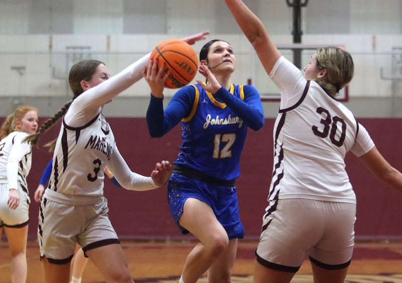 Johnsburg’s Addie Graff works under the net in varsity girls basketball on Tuesday, Jan. 6, 2026 at Homer “Bill” Barry Gymnasium on the campus of Marengo High School in Marengo.