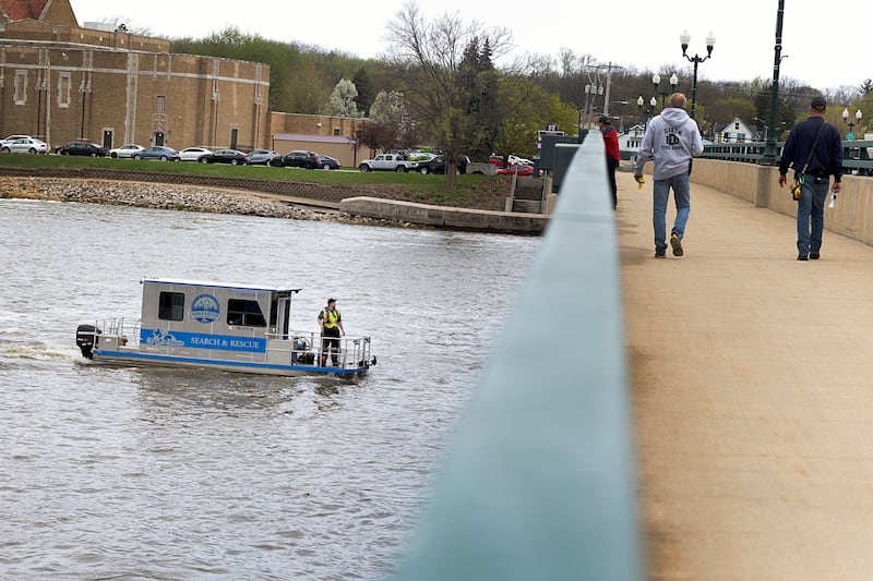 Search squads check the Rock River in Dixon Tuesday, April 14, 2026, after an individual jumped over the railing off of the Peoria Avenue Bridge late Monday night.