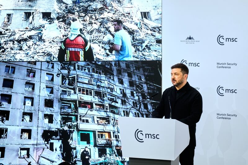 Ukraine's President Volodymyr Zelenskyy addresses the audience during a session at the Munich Security Conference in Munich, Germany, Saturday, Feb. 14, 2026. (AP Photo/Michael Probst)