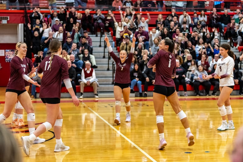 Lockport celebrates after winning the first set during a 4A Supersectional girls volleyball game against Oak Park-River Forest at Hinsdale Central on Nov. 10, 2025.