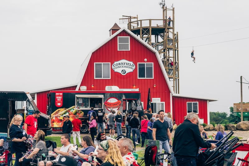 Some fest-goers check out the Pixie Dawgs food truck while others set up their live music watch spots during last year’s B4 Summer Festival at the Richardson Adventure Farm in Spring Grove.