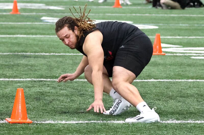 Former Northern Illinois University defensive tackle Devonte O’Malley runs a shuttle drill for NFL scouts during pro day Monday, March 17, 2025, in the Chessick Practice Center at NIU in DeKalb.