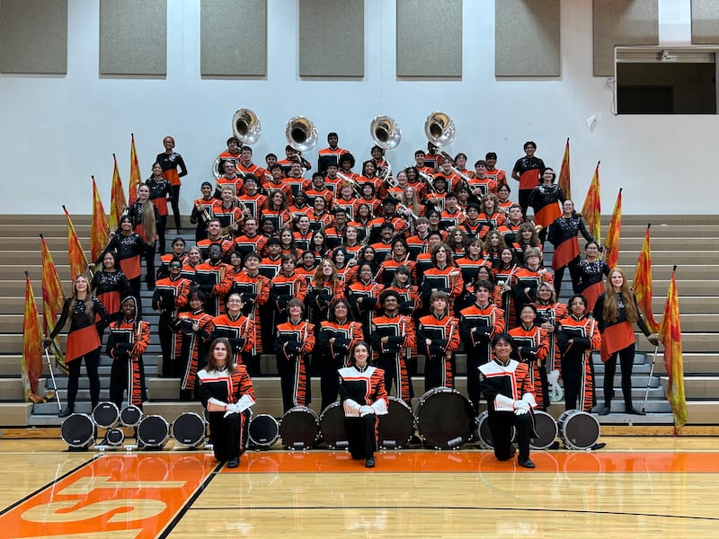 Members of the Plainfield East High School marching band. The band will perform at the annual 2025 Disney World Thanksgiving Day Parade of Bands on Nov. 27, 2025.